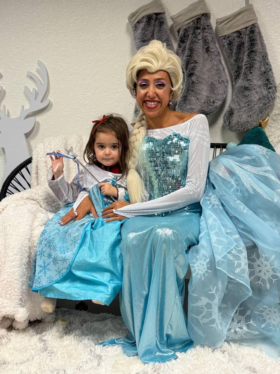 Elsa character entertainer with face painting at a Frozen themed birthday party in the Bay Area