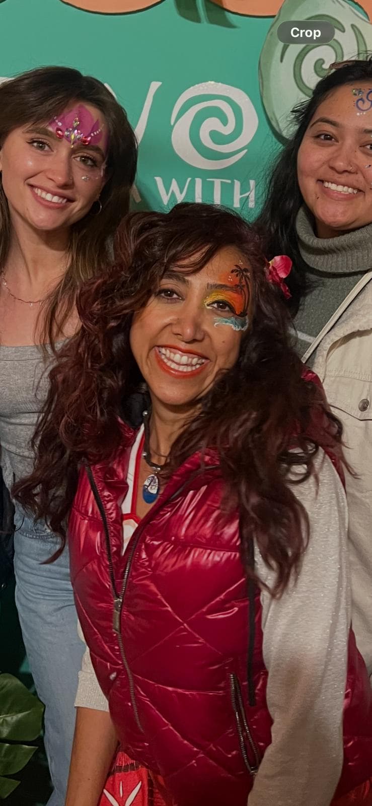 Flower face painting for adults at a fall festival
