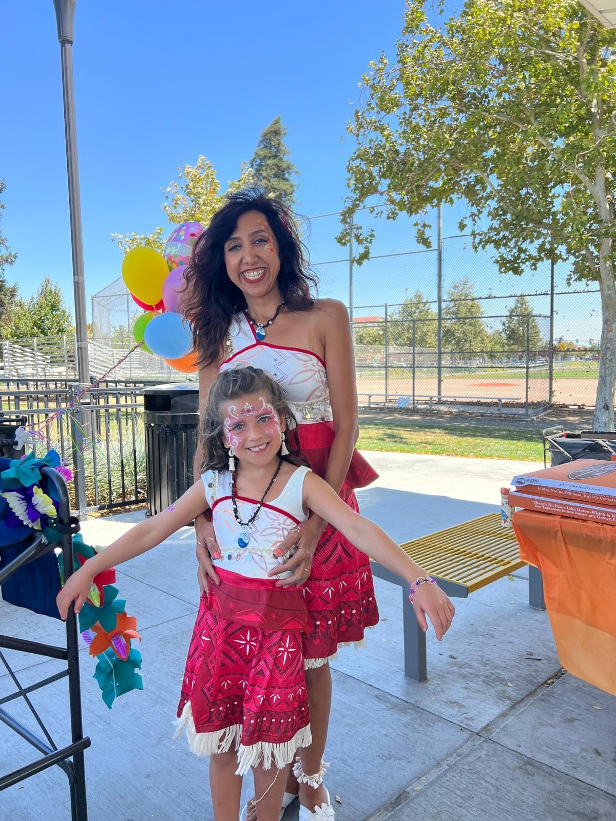 Moana themed birthday party with a Moana character host and face painting for kids